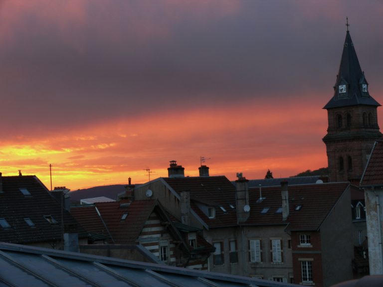 2019,:,Sunset,Over,The,Rooftops